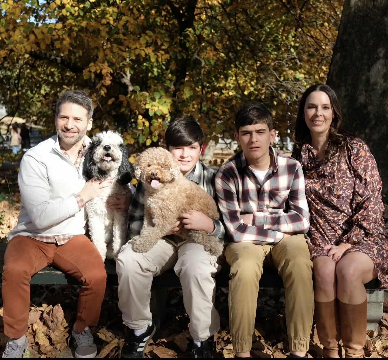 Aron Boxer with family and dogs