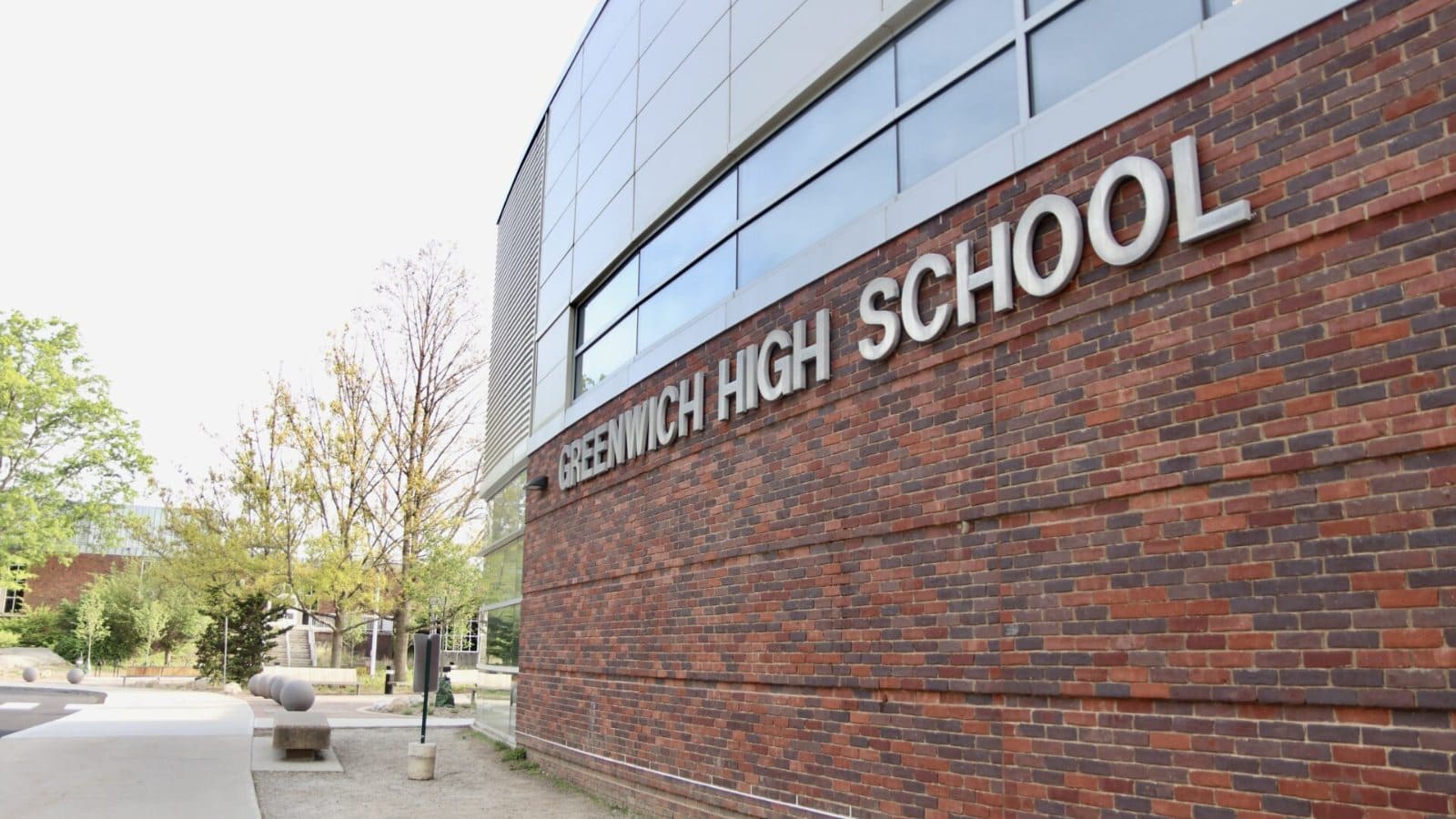 Greenwich High School, illustrating Aron Boxer’s Greenwich Free Press op-ed on why the 6-8, 9-12 grade span model fails kids